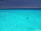 Ilôt N'gé, la photo est à peine retouchée, le bleu est incroyable !